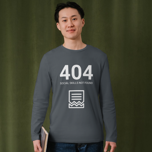Person wearing a gray shirt with '404 Social Skills Not Found' text against a green background