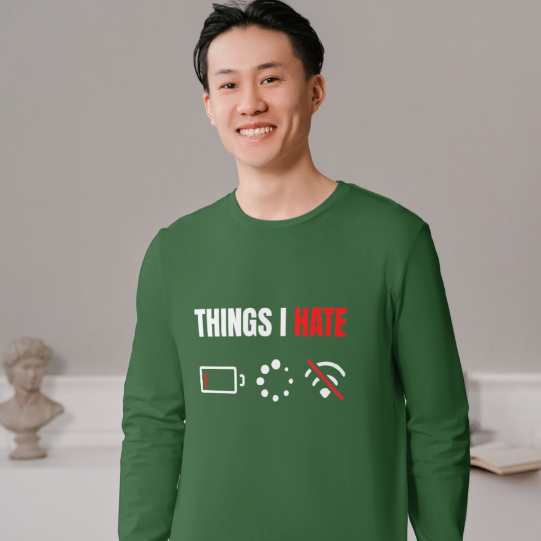 Person wearing a green shirt with text and icons on a neutral background