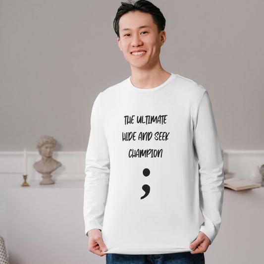 Person wearing a white shirt with text "the ultimate hide and seek champion" and a black semicolon symbol.