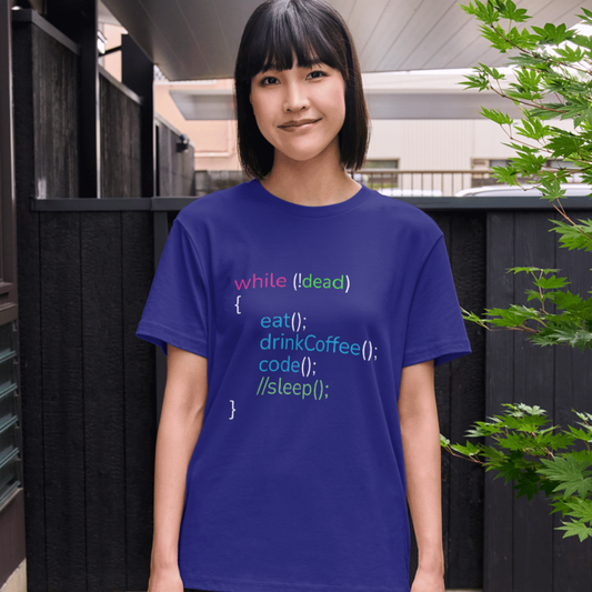 Person wearing a blue t-shirt with code text outdoors