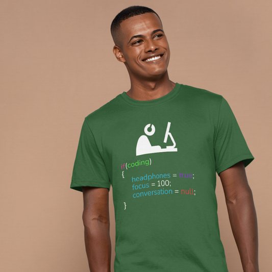 Man wearing a green t-shirt with a coding graphic and text on a beige background