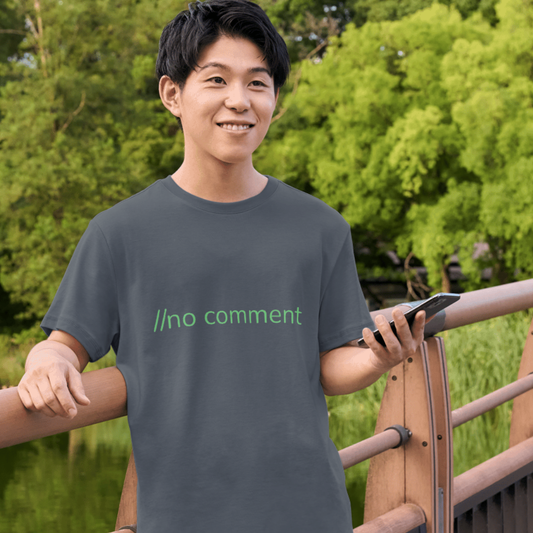 Person wearing a t-shirt with 'no comment' text outdoors