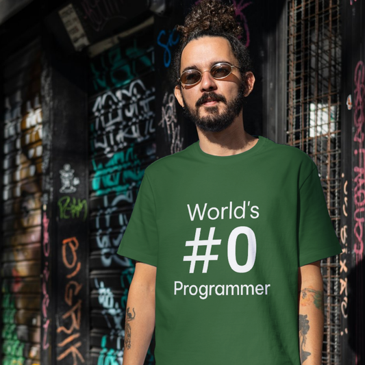Man wearing a green t-shirt with 'World's #0 Programmer' text in front of a graffiti-covered wall.