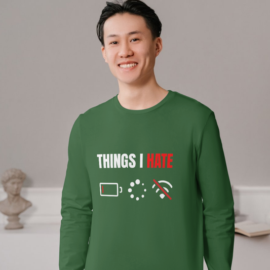 Person wearing a green shirt with text and icons on a neutral background