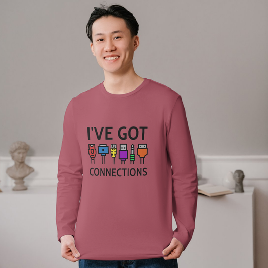 Person wearing a maroon shirt with colorful code connection graphic and text in a room.