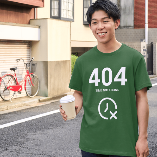 Person wearing a green t-shirt with '404 Time Not Found' design, holding a coffee cup on a street.